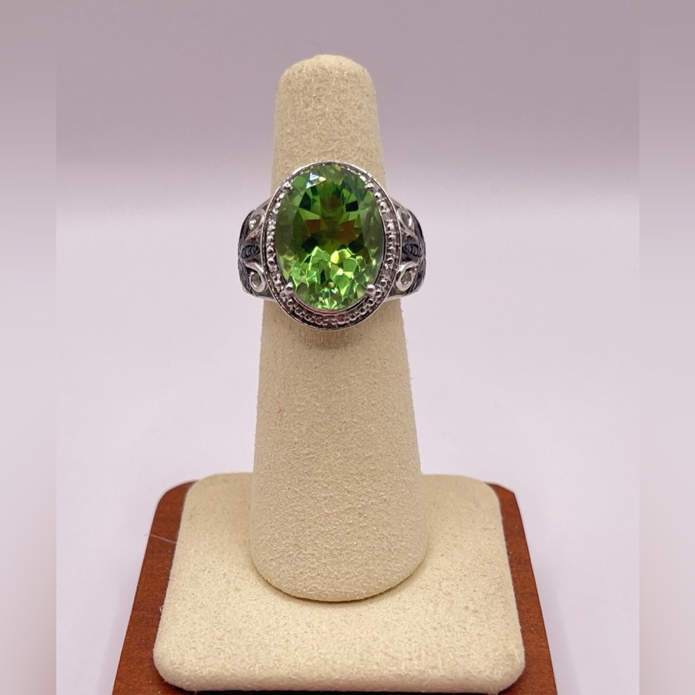 Simulated peridot in sterling silver with black rhinestone accents